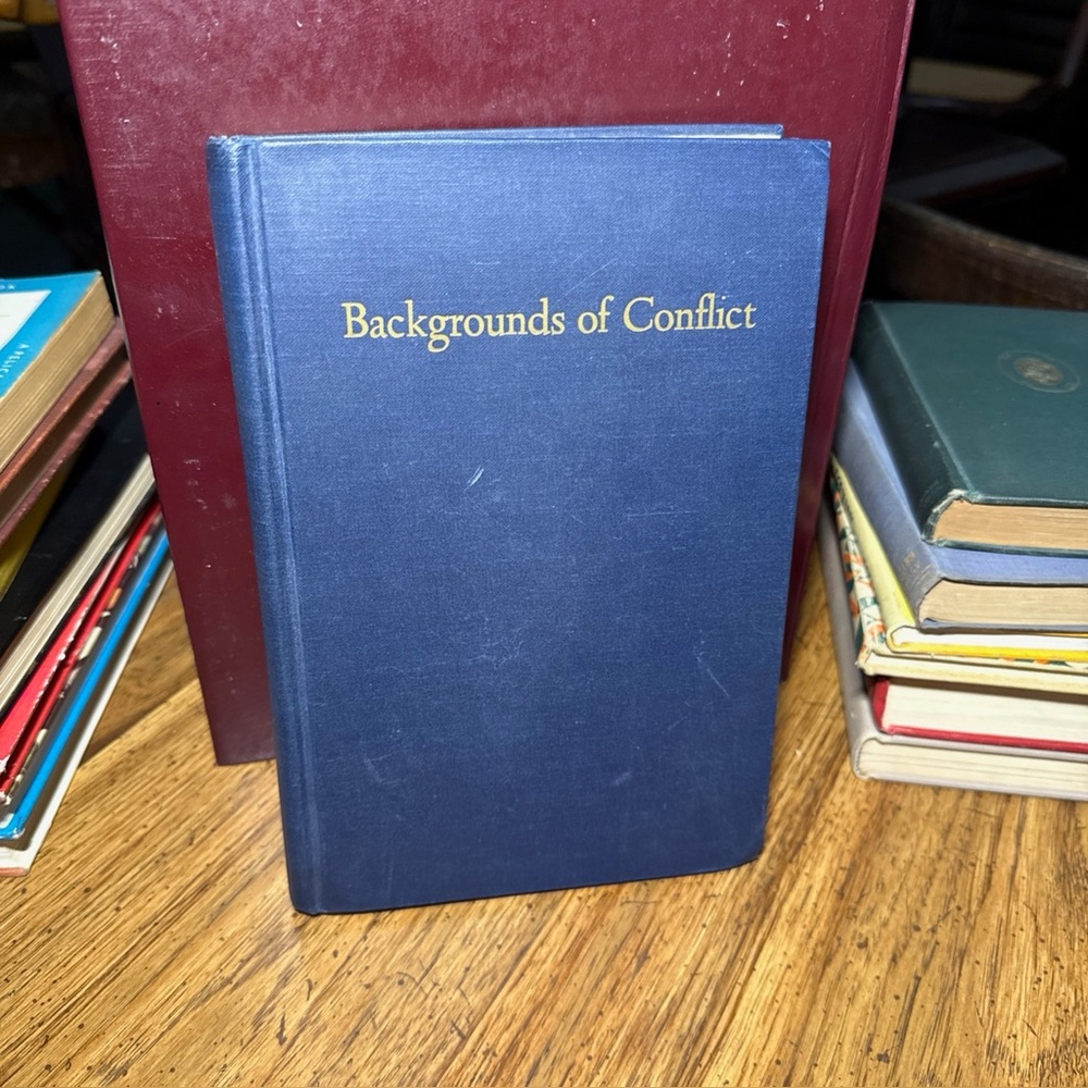 Blue 'Backgrounds of Conflict' Hardcover Book